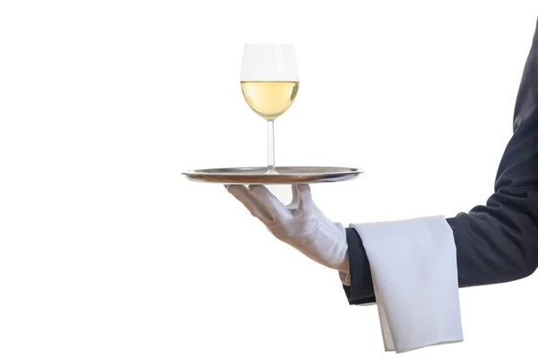 Официант, подающий вино на подносе — стоковое фото