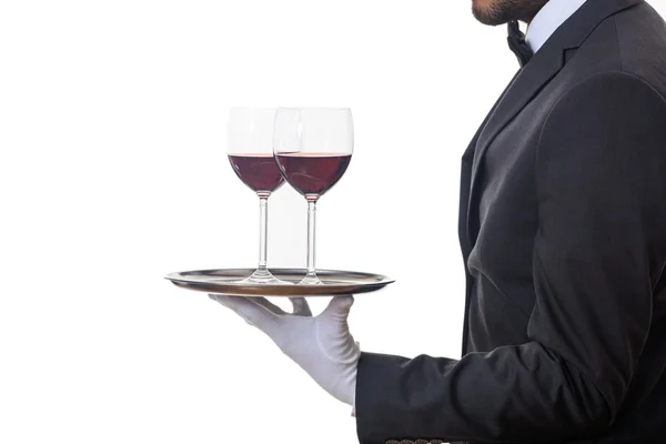 Cameriere che serve vino su un vassoio — Foto Stock