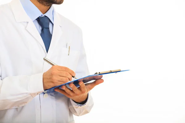 Doctor holding a clipboard on white background — Stock Photo, Image