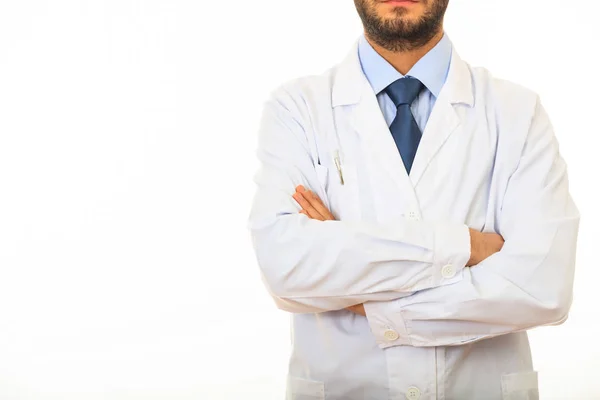 Doctor con brazos cruzados sobre fondo blanco — Foto de Stock