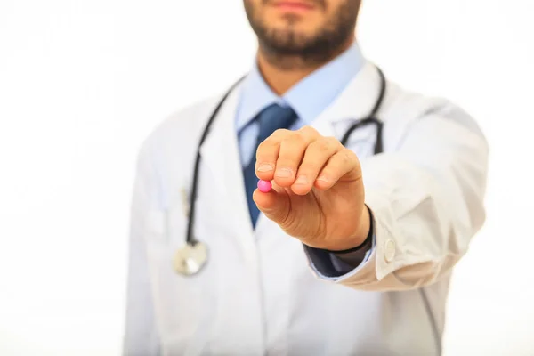 Doctor offering a pill — Stock Photo, Image