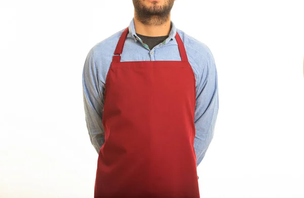 Jovem com avental vermelho — Fotografia de Stock