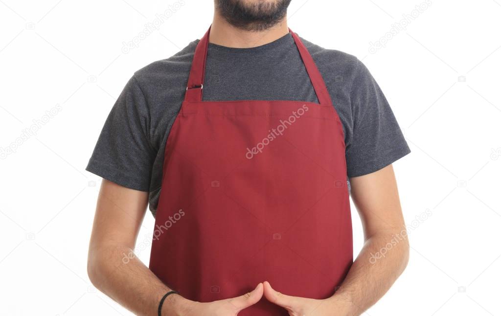 Young man with red apron