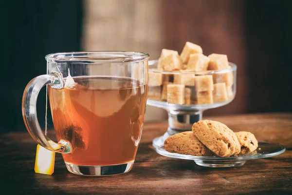 A transparent mug of tea — Stock Photo, Image