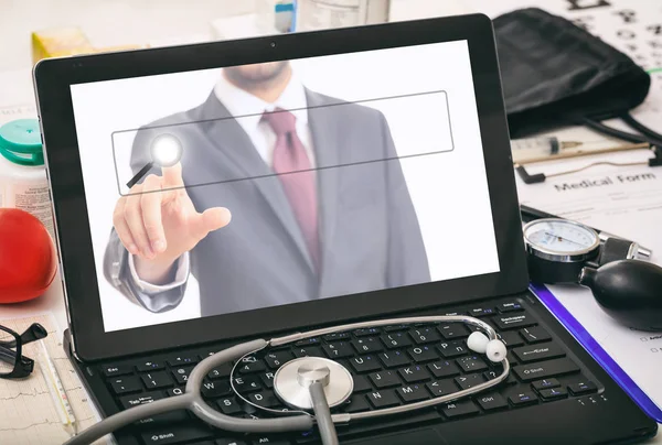Computer on a doctor's desk — Stock Photo, Image