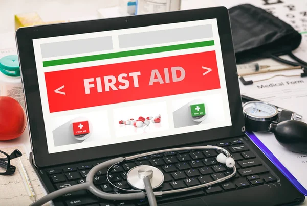 First aid written on a doctor's computer screen