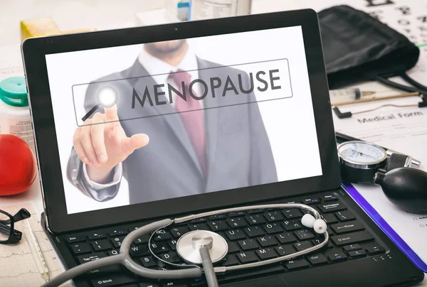 Menopausia escrita en la pantalla de un ordenador —  Fotos de Stock
