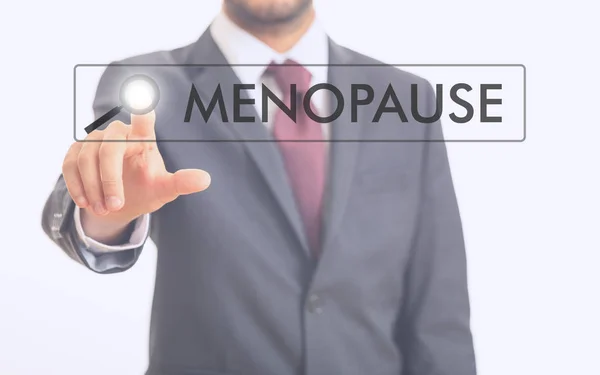 Hombre apuntando a la palabra menopausia —  Fotos de Stock