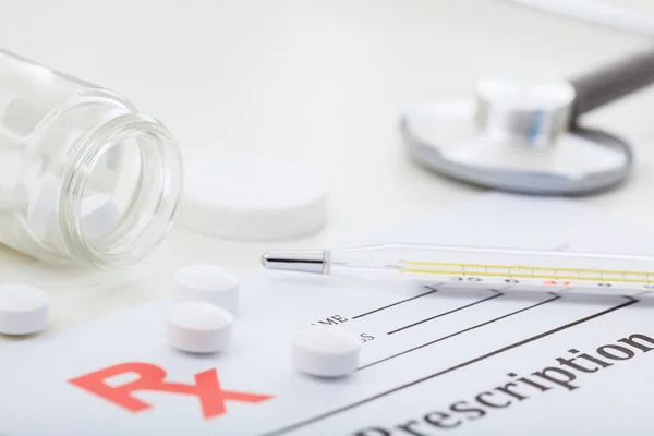 Pills out of a bottle — Stock Photo, Image