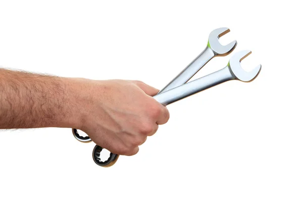 Hand holding spanners on white background — Stock Photo, Image