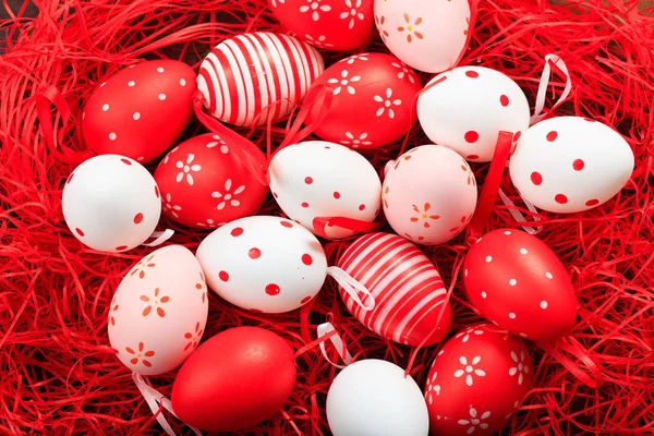 Easter eggs on straw background — Stock Photo, Image
