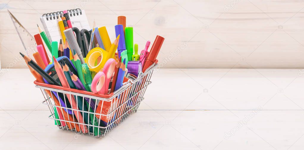 School shopping basket on white background
