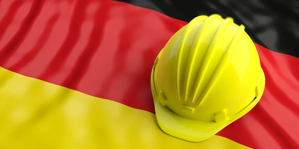 Yellow helmet over Germany flag. 3d illustration