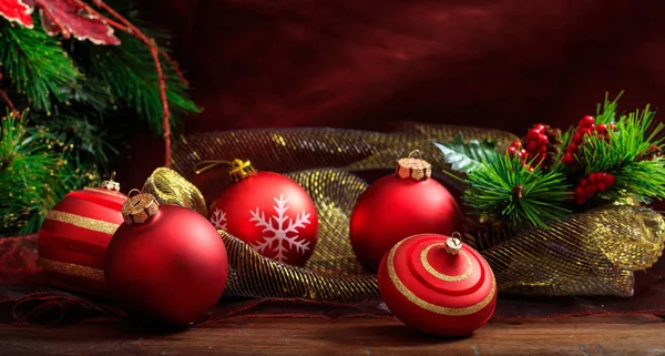 Red christmas balls on wooden background — Stock Photo, Image