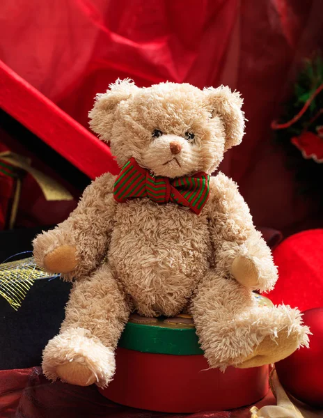 Christmas balls, teddy bear and gifts — Stock Photo, Image
