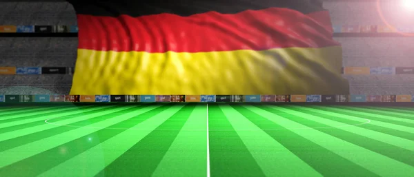 照明付きのサッカー フィールドにドイツの国旗。3 d イラストレーション — ストック写真