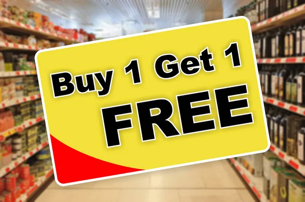Buy one get one free yellow label on an abstract Supermarket background