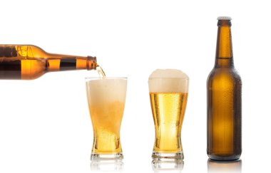 Bottles and glasses of beer on white background clipart