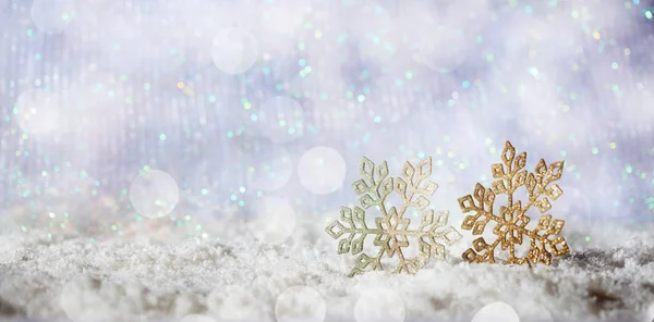 クリスマス雪ボケ背景に雪の結晶 — ストック写真