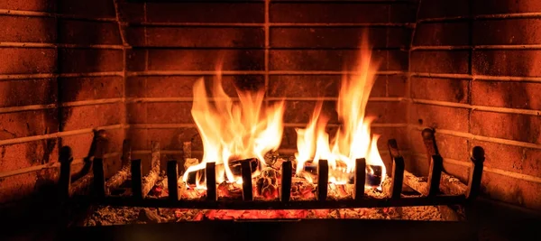 Logs burning in a fireplace — Stock Photo, Image
