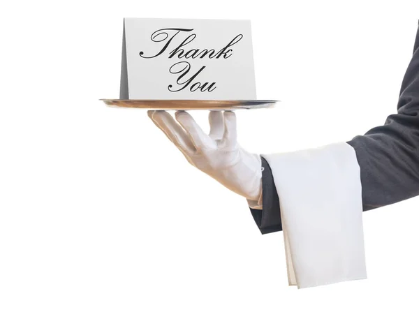 Camarero ofreciendo una bandeja con una tarjeta de agradecimiento — Foto de Stock