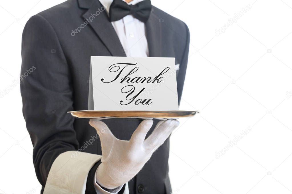 Waiter offering a tray with a Thank you card