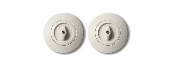 Dos interruptores vintage redondo blanco con botón aislado sobre fondo blanco. Vista de cerca con detalles . —  Fotos de Stock