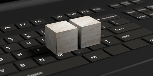 Zwei leere Würfel auf einem schwarzen Laptop. 3D-Illustration — Stockfoto