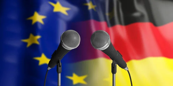 Beziehungen zwischen der EU und Deutschland. zwei Kabelmikrofone vorne. Flaggen für den Hintergrund. 3D-Illustration — Stockfoto