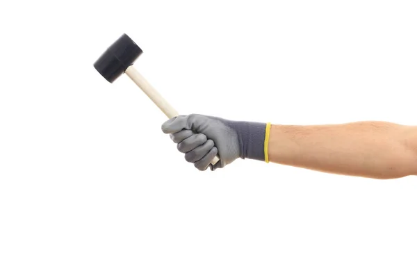 Gehandschoende hand met een rubber mer op witte achtergrond — Stockfoto