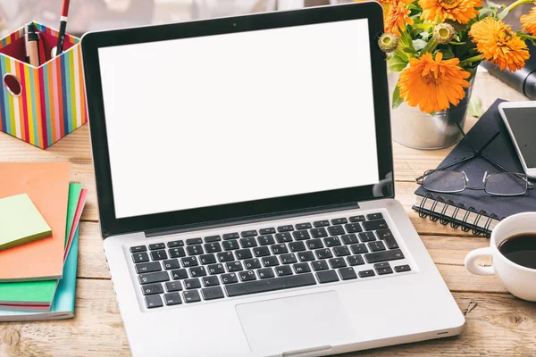 Blank computer screen on an office desk, copy space