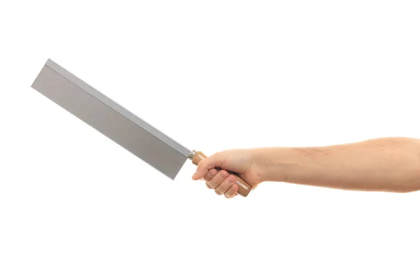 Hand holding a saw on white background — Stock Photo, Image