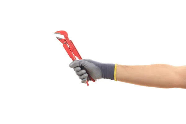 Hand holding a pipe wrench on white background — Stock Photo, Image