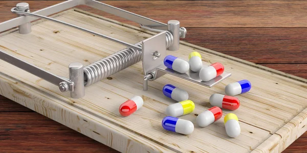 Un piège médical. Pilules et un piège à souris sur le sol en bois. Illustration 3d — Photo