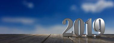 New year 2019 on wooden floor, blue sky at sunrise, banner, copy space. 3d illustration