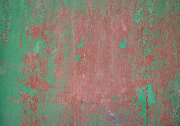 Fondo de pared pintado rojo verde envejecido parcialmente descolorido —  Fotos de Stock