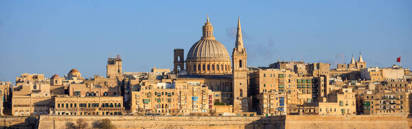 Valletta, Malta, Skyline in the afternoon with the dome of the Carmelite Church and the tower of St Paul 's
