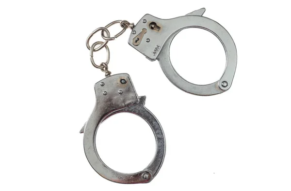 Metal handcuffs isolated on white background, top view — Stock Photo, Image