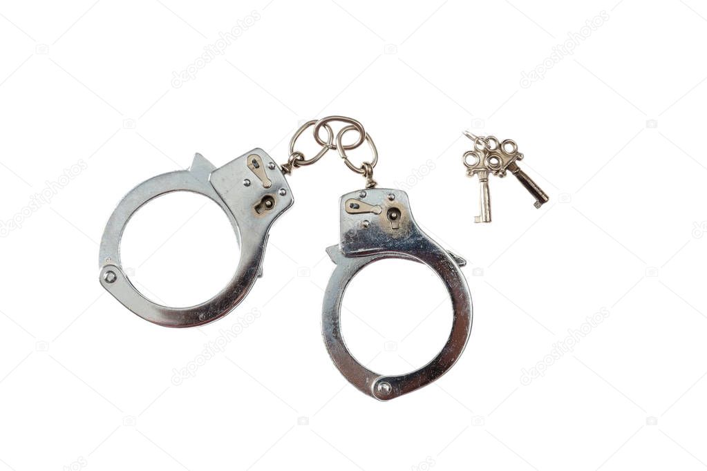 Metal handcuffs isolated on white background, top view