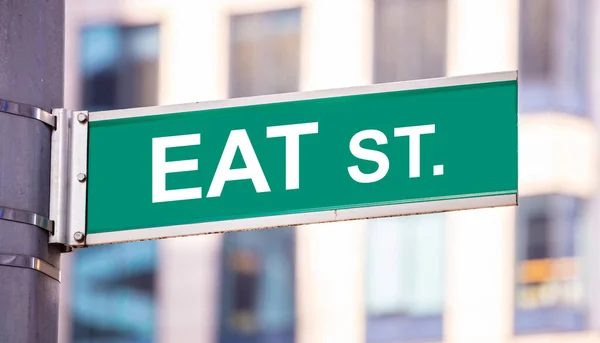 Eat street sign, street food concept, blur buildings background