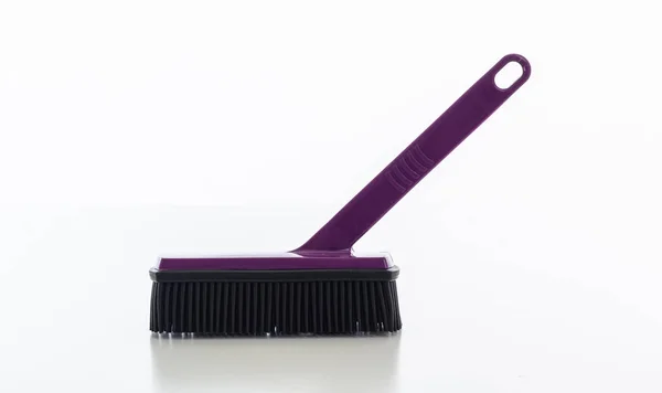 Cleaning brush purple color isolated against white background. — 스톡 사진