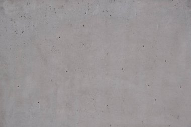 Somut arka plan dokusu. Pürüzsüz beton malzeme, bina duvarı ya da zemin, gri renk.