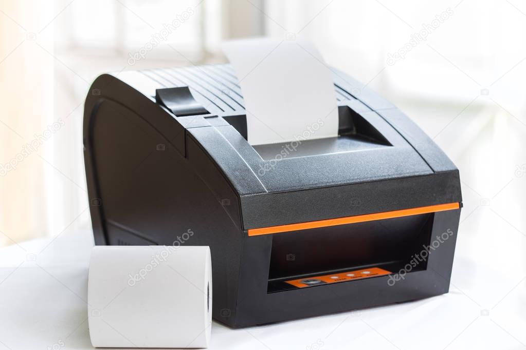 Office equipment, A point of sale receipt printer printing a receipt