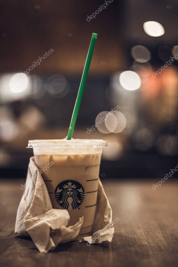 BANGKOK, THAILAND - OCT 22, 2017 Iced caramel macchiato coffee at Starbucks shop. Starbucks is the world largest coffee house.