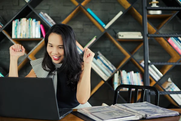 asian business woman happy with her finished work Successful