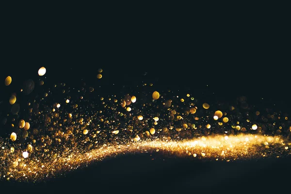 Fondo dorado de superposición de luces doradas con efecto bokeh. En —  Fotos de Stock