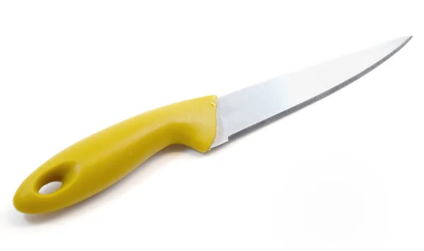 Plastic serrated kitchen knife with yellow handle — Stock Photo, Image