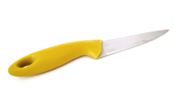 Plastic serrated kitchen knife with yellow handle — Stock Photo, Image