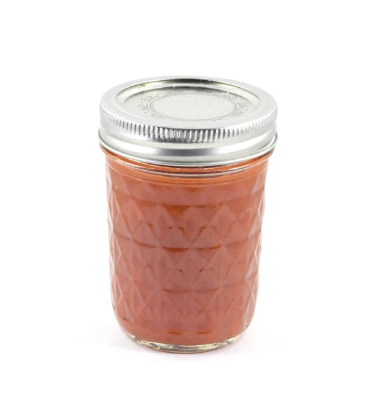 Rote Sauce aus der Dose im Glas — Stockfoto