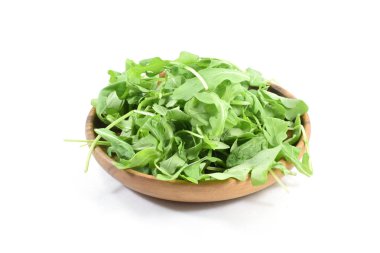 Rustik ahşap plaka üzerinde taze organik roka